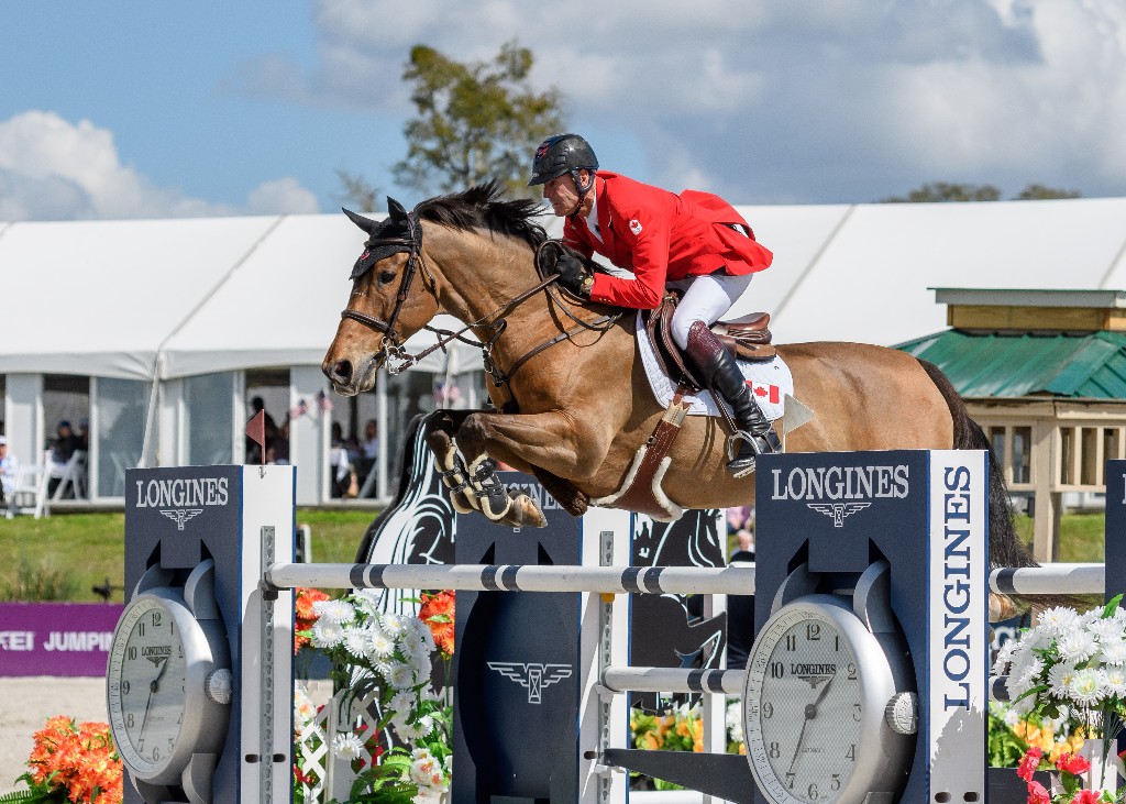 Ian Millar of Perth, ON, delivered double clear rounds for Canada riding Dixson for owner Ariel Grange.  Photo Credit – Starting Gate Communications